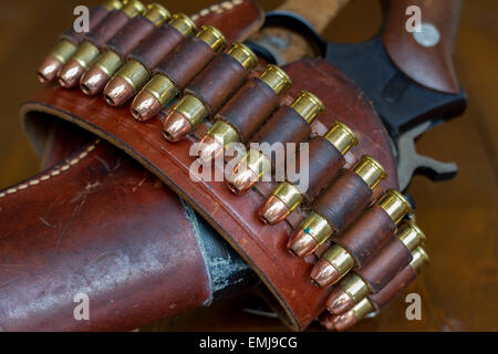 A gun belt on a historic .357 magnum revolver. Stock Photo