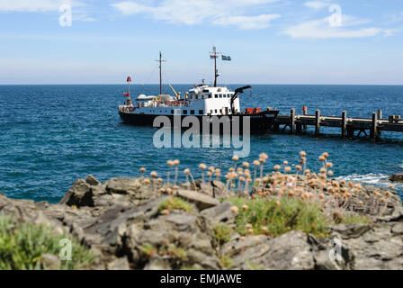 The passenger ferry MS Oldenburg docked at the pier on the island of Lundy in North Devon, England , UK Stock Photo