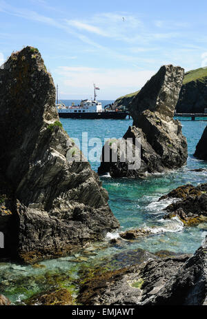 The passenger ferry MS Oldenburg docked at the pier on the island of Lundy in North Devon, England , UK Stock Photo