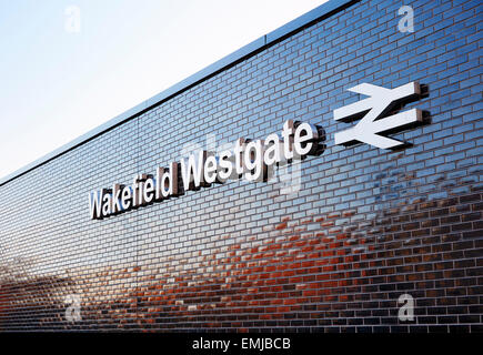 Large sign on exterior wall of Wakefield Westgate railway station. Copy space for text Stock Photo