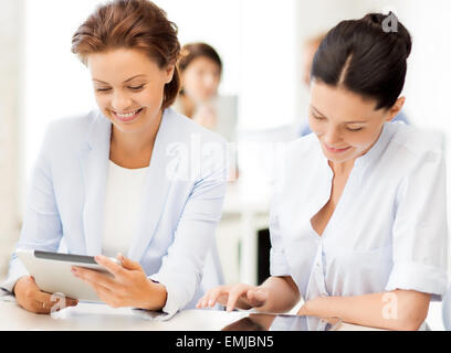 business team working with tablet pc in office Stock Photo
