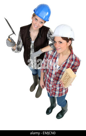 Two female masons Stock Photo