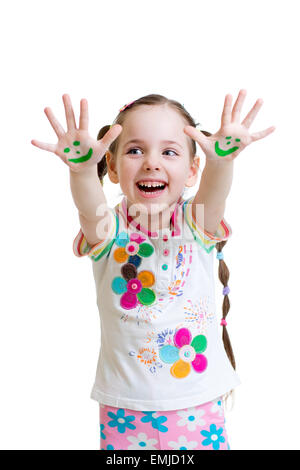 Little girl showing painted hands with funny face Stock Photo