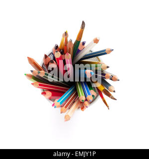 Colorful pencils and brushes in holder. Isolated on white background. Top view Stock Photo