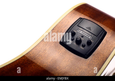Color detail shot of an acoustic guitar equalizer. Stock Photo