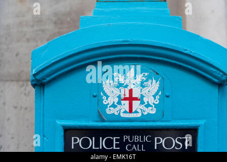 An old Police phone box from which the public could directly call the local police station.  No longer operational Stock Photo