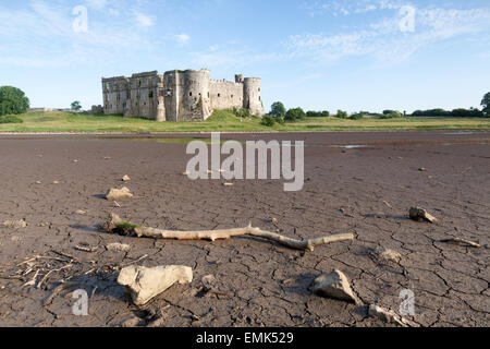 Pembrokeshire, Wales : medieval castle ruins facing a drained pond Stock Photo