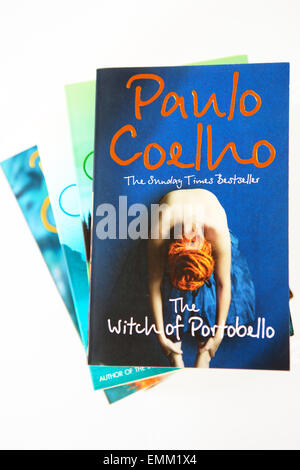 Pile of Paulo Coelho a Brazilian writer paperback books. Stock Photo