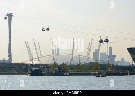 The O2 Arena on the Greenwich Peninsular at Dockland, London, England. Viewed from across river Thames with Emirates Cable Car. Stock Photo