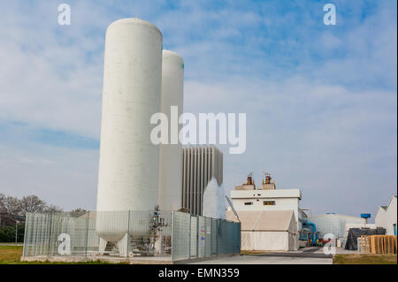 Liquid oxygen plant, tanks and heat exchange coils, the background a factory Stock Photo
