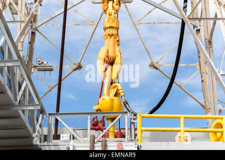 oil derrick and top drive for ocean drilling Stock Photo