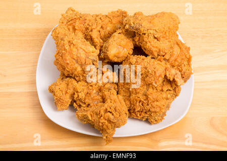 Fresh, crispy, fried chicken on a white plate Stock Photo