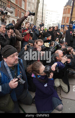 press photographers outside New Scotland Yard in London Stock Photo