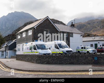 Royal Air Force Mountain Rescue Service vehicles parked outside Ogwen Cottage in mountains of Snowdonia. Ogwen Gwynedd Wales UK Stock Photo