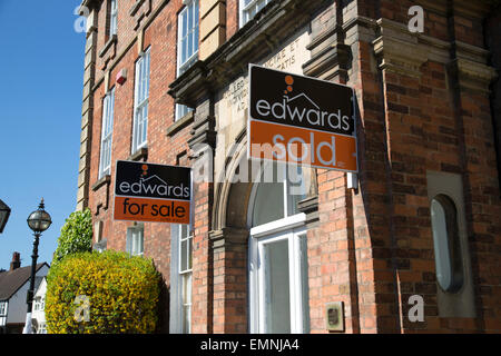Estate agents for sale and sold boards outside a property in Stratford upon Avon, Warwickshire, England Stock Photo