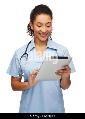 doctor or nurse with stethoscope and tablet pc Stock Photo