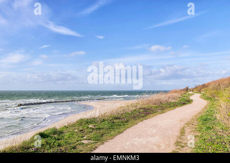 Coast with cliff, grass, Baltic Sea and sky on a stormy day near Ahrenshoop, Germany Stock Photo