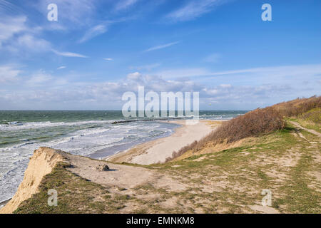 Coast with cliff, grass, Baltic Sea and sky on a stormy day near Ahrenshoop, Germany Stock Photo