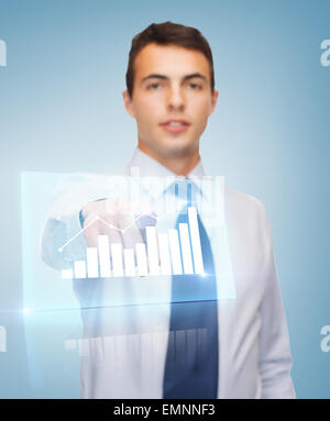 buisnessman pointing finger to virtual screen Stock Photo