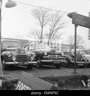 Prices slashed as a crisis hits the second hand car market. A second hand car lot in Warwick Road W14. 23rd February 1960 Stock Photo