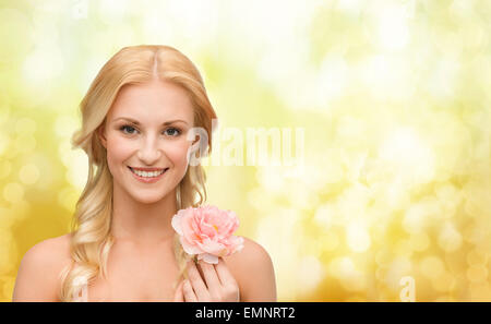 smiling woman with peony flower Stock Photo