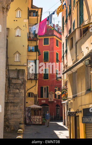 Genoa alley, view of a typical narrow street in the medieval centre of Genoa - the Centro Storico; Liguria, Italy. Stock Photo