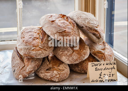 Presteigne, Powys, UK. Freshly baked sourdough loaves made by artisan baker Alex Gooch Stock Photo