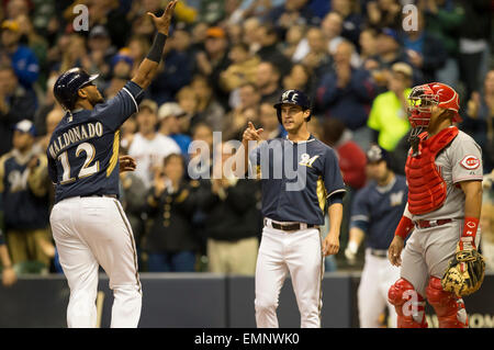 Milwaukee, USA. August 24, 2018: Pittsburgh Pirates center fielder Starling  Marte #6 along with the Brewer infielders watch the review challenge on the  jumbo screen of Martes stolen base in the 11th