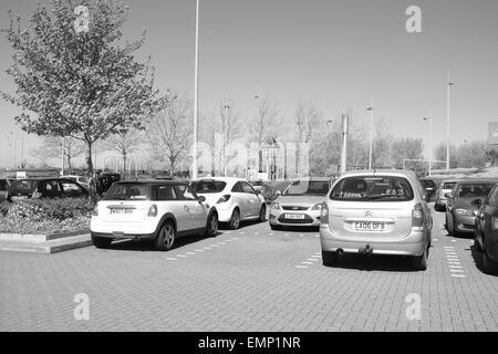 Found it, lone car parking space in a busy car parking lot in Bristol, 22nd April 2015 Stock Photo