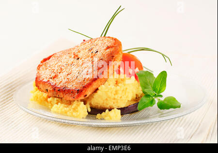 Marinated pork served with couscous