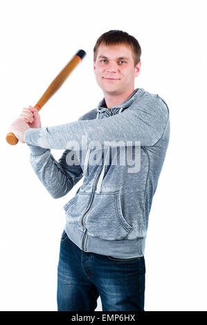 Young man posing with baseball bat on isolation white background Stock Photo