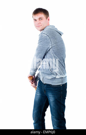 Young man posing with baseball bat on isolation white background Stock Photo