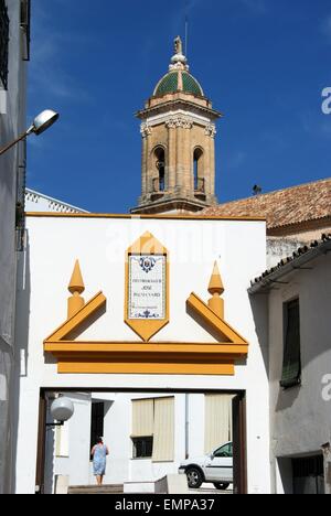 Church of the Hospital entrance and bell tower (Iglesia del Hospital), Aguilar de la Frontera, Cordoba Province, Spain. Stock Photo