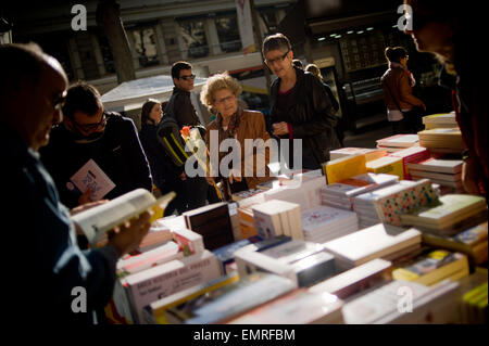 People looking at book's stall in the streets of Barcelona. Stock Photo