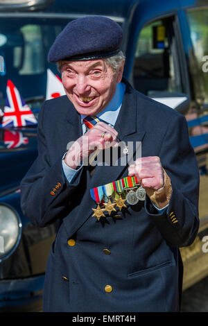 Peter Kent, 90 Royal Navy, show off his boxing skills - Second World War Veterans and serving Guardsmen on Horse Guards Parade Ground to highlight Royal British Legion events on Victory in Europe (VE) Day. The Legion is also announcing that veterans and their carers will receive funding towards attending the event on the weekend of the 8-10th May.  Places will be available for a series of commemorative events over the weekend including on VE Day itself, Friday 8 May, when a Service of Remembrance will be held at The Cenotaph, with a national two min Stock Photo