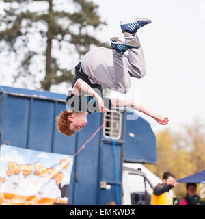 A Free runner demonstrating Parkour at Framlingham Country Show in Framlingham , Suffolk , England , Britain , Uk Stock Photo