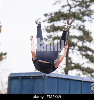 A Free runner demonstrating Parkour at Framlingham Country Show in Framlingham , Suffolk , England , Britain , Uk Stock Photo