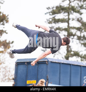 A Free runner demonstrating Parkour at Framlingham Country Show in Framlingham , Suffolk , England , Britain , Uk Stock Photo