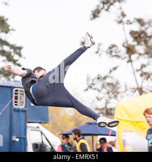 A Free runner demonstrating Parkour at Framlingham Country Show in Framlingham , Suffolk , England , Britain , Uk Stock Photo