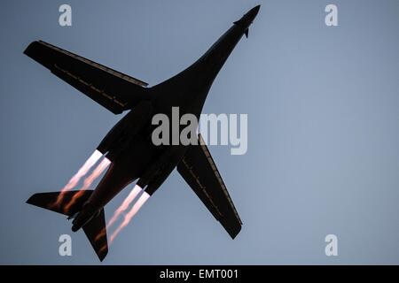 A US Air Force B-1B Lancer stealth bomber takes off from Al Udeid Airbase for a mission against Islamic State fighters April 8, 2015 in Qatar. Stock Photo