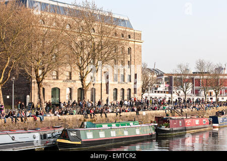 Boats and narrow boats and Arnolfini Arts Gallery at Harbourside in Bristol city centre, England, Europe. End of March. Sunny Sp Stock Photo