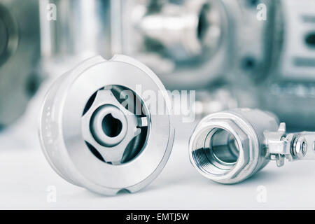Check and ball valve with selective focus on thread fittings Stock Photo