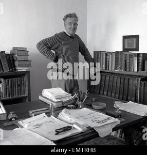 1953, historical picture of English author, novelist, critic, translator and classicist poet, Robert Graves, at his desk, Dela -Soller, Majorca. Stock Photo