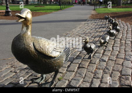Duckling statues located in Boston Public Gardens which were made to honor the book Make Way for Ducklings Stock Photo