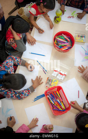 Children at an illustration workshop at the Ealing Road Library in the borough of Brent council in london Stock Photo