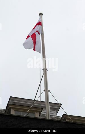 Westminster, London, UK. 23rd April, 2015. The flag of Saint George flies above 10 Downing street  in Westminster to celebrate Saint Georges day Credit:  amer ghazzal/Alamy Live News Stock Photo