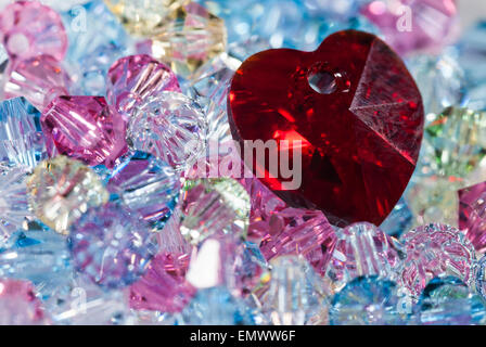 Closeup of Red Heart on tiny glass beads Stock Photo