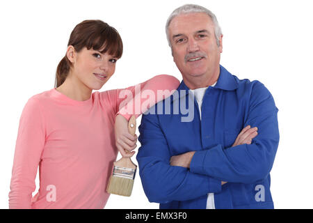 A painter and his apprentice. Stock Photo