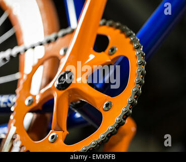 Bicycle chain and chain-ring, close up at a bike shop. Stock Photo