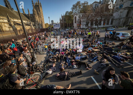 London, UK. 23rd April, 2015. Die-In Protest for Migrants outside Parliament Buildings Credit:  Guy Corbishley/Alamy Live News Stock Photo